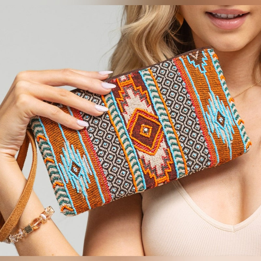 Clutches, Wristlets & Pouches